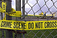 Crime scene tape outside South Florida Crop Care company