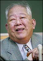 Masatoshi Koshiba shares the Nobel Prize in physics.
