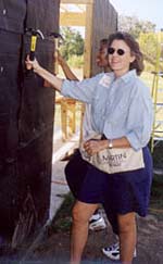 Susan Eaton helping build a Habitat for Humanity house