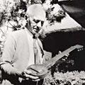 Adolph Rickenbacker with original frying pan guitar